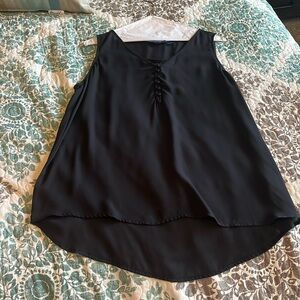 Sleeveless black loose fitting dressy top